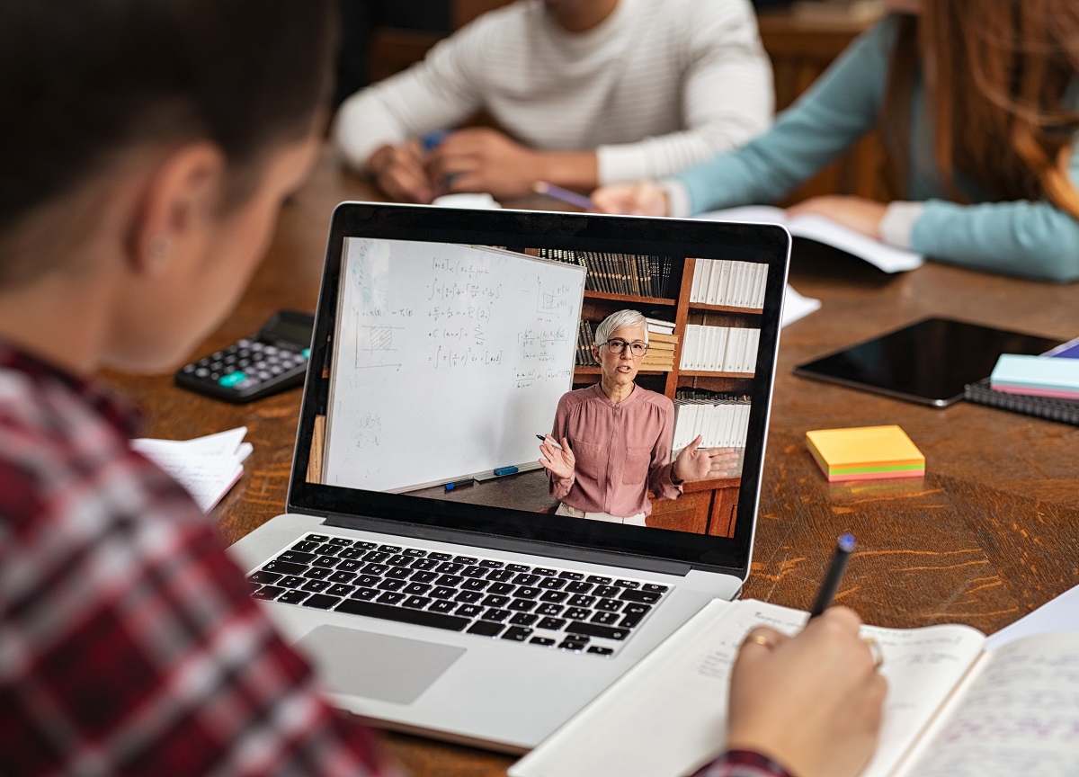 Student watching online lesson